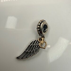 Authentic Pandora sterling silver Love & Guidance wing dangle charm, SKU 791389.